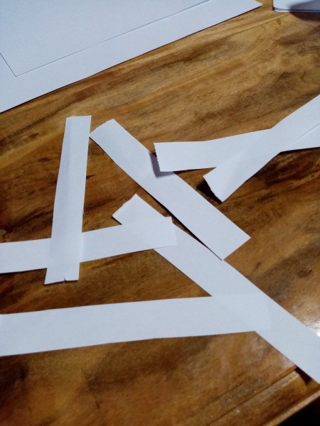 Ghost Night Light - cut out 3 inch long thin strips of paper