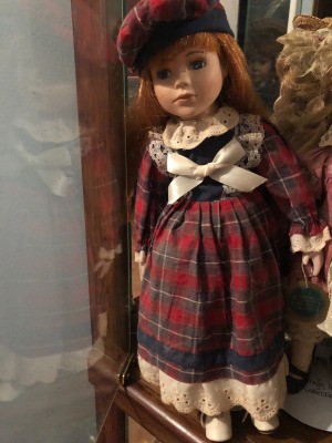 Value of a Century Collection Porcelain Doll - doll wearing a plaid dress and matching hat