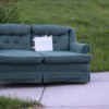 A free couch left on the curb.