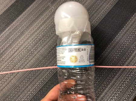 Floating Fabric Ghost - cut hanger or wire to poke through the bottle to craft the arms