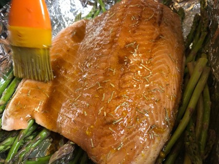 brushing marinade on salmon Salmon