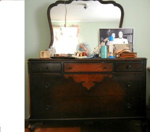 Value of a Vintage Dresser with Mirror - dark finish dresser with lighter veneer pattern in middle of  drawers