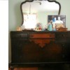 Value of a Vintage Dresser with Mirror - dark finish dresser with lighter veneer pattern in middle of  drawers