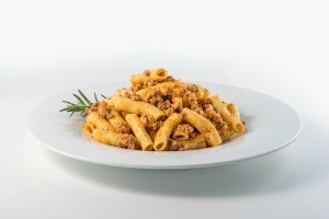 A macaroni dish with a hearty meat sauce.