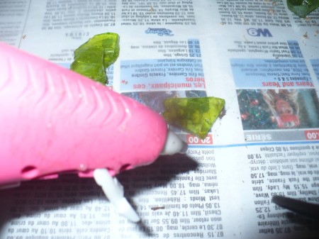 Recycled Glass Light Fixture Terrariums - gluing decorative rocks together