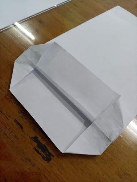 Gentleman Themed Paper Goody Bag - open the fold and push the sides inward as shown