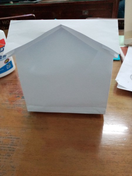 Gentleman Themed Paper Goody Bag - this is what it looks like standing with triangle removed to create a collar