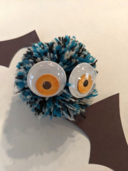 Pom Pom Bat Decoration - glue googly eyes to pom pom