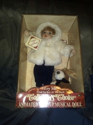 Value of a Singing Collector's Choice Porcelain Doll - doll in the box
