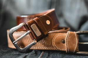 Two leather belts.