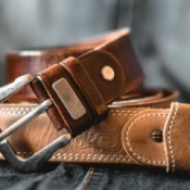 Two leather belts.