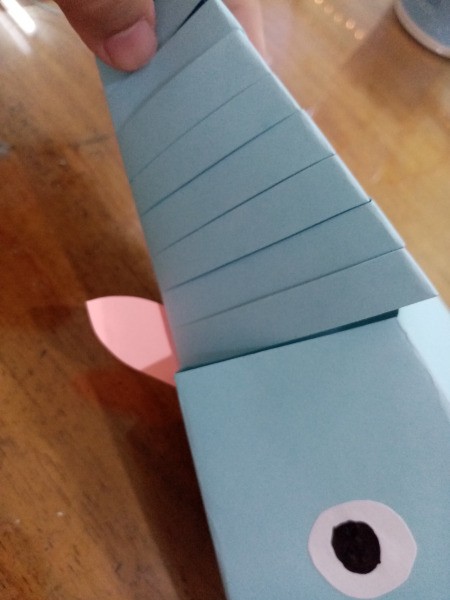 Paper Fish - glue on the sides below the head of the fish