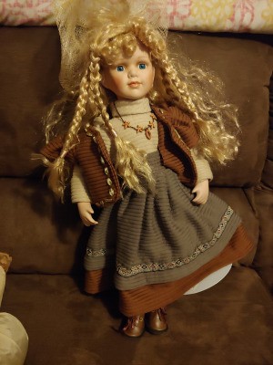 Value of Porcelain Dolls - doll with long blond braids