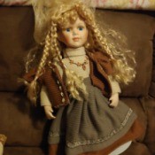 Value of Porcelain Dolls - doll with long blond braids