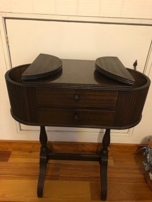 Identifying an Old Sewing Cabinet - dark finish sewing cabinet with fold top opening on each side of the top and two drawers