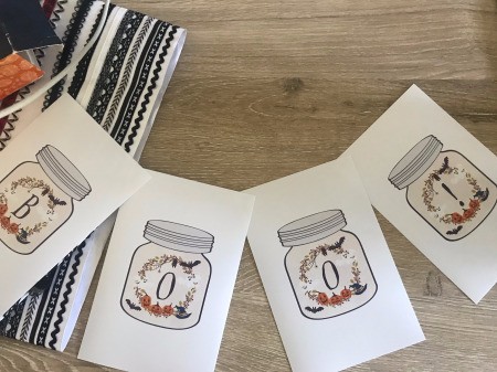 Halloween Boo! Banner Using Free Printables - four pages arranged and attached to each other