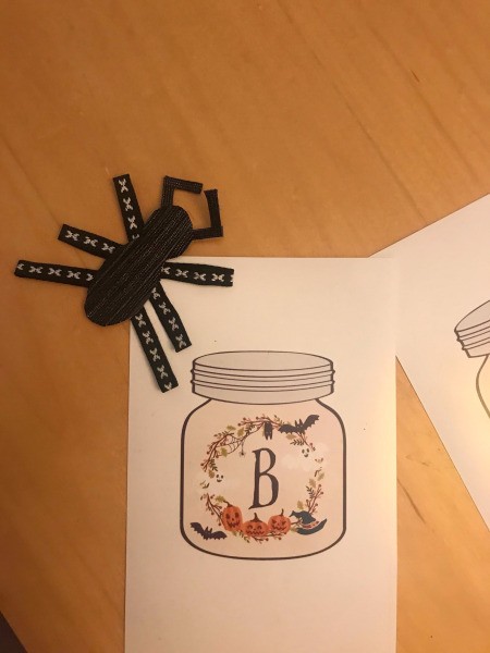 Halloween Boo! Banner Using Free Printables - stick spiders to the ends
