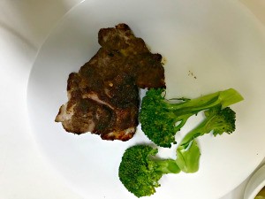 chicken Thighs with broccoli on plate