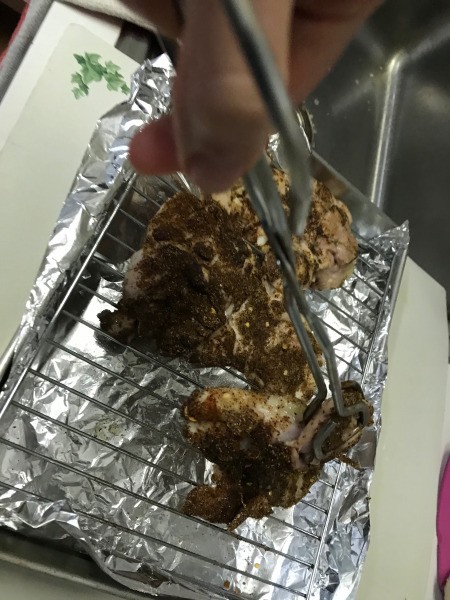 turning chicken on rack