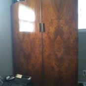 A wardrobe with a beautiful burl pattern.