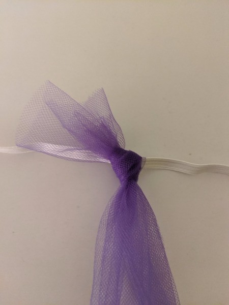 Unicorn Halloween Costume - knot around the elastic