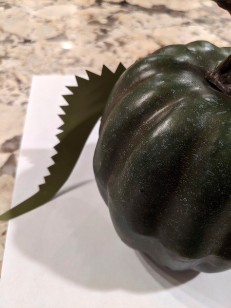 Dragon Pumpkin Decoration  - attach the tail to the back of the pumpkin with glue or tape