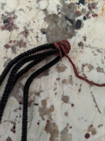 Fabric Covered Foam Pumpkin - start at the twist and wrap with brown yarn