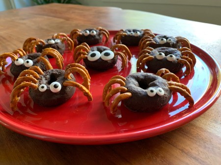 Halloween Spider Donuts - spider donuts have different size eyes