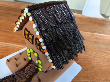 Haunted Gingerbread House - roof detail with licorice tiles on kit house