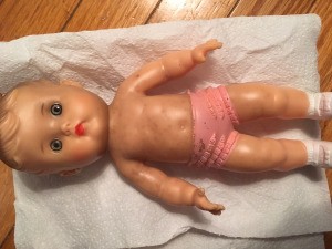 Removing Mold Stains and Odor from a Rubber Doll - vintage doll with molded and painted pink undies