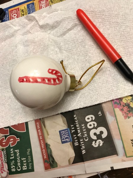 Decorated Clear and White - Ornaments - candy cane drawn on a white ornament with a red marker