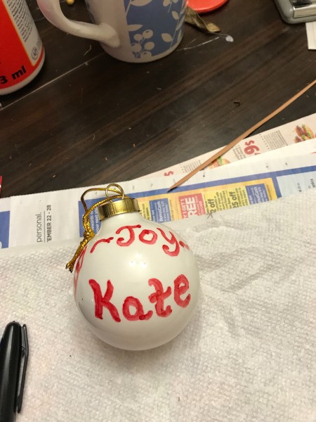 Decorated Clear and White Ornaments  - white ornament that says Joy and Kate