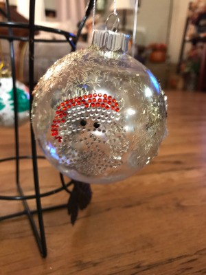 Decorated Clear and White Ornaments - clear ornament with a Santa sticker