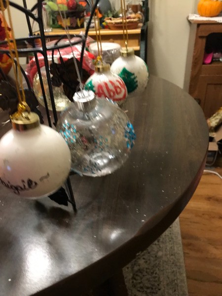Decorated Clear and White Ornaments - several ornaments hanging to dry