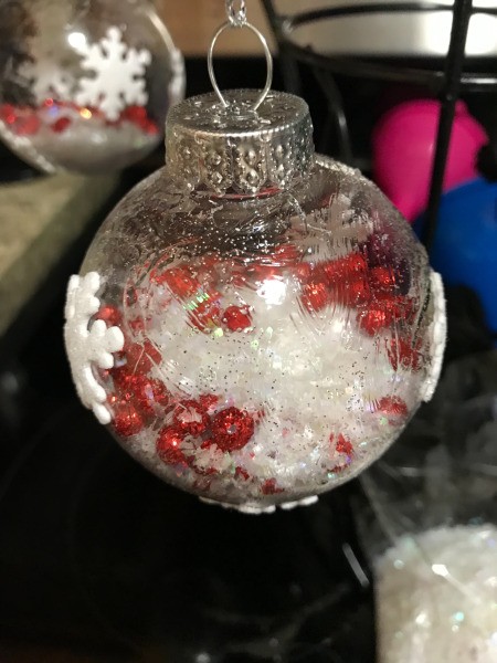 Decorated Clear and White Ornaments  - snow added and cap replaced, also looks like glitter glue applied