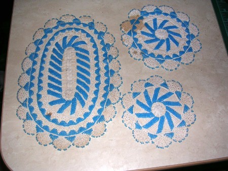 Cleaning Stains on Beaded Crochet Items - white crochet doilies and oval mat with blue seed beading
