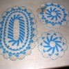 Cleaning Stains on Beaded Crochet Items - white crochet doilies and oval mat with blue seed beading