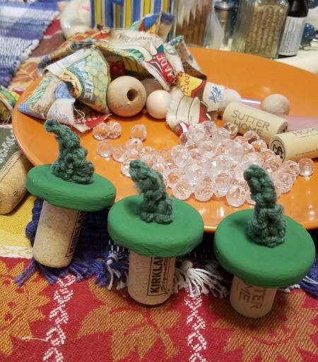 Pumpkin Jars - corks on underside of lids to make it easy to paint them green