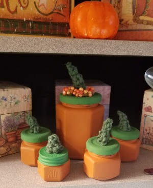 Pumpkin Jars - array of jars sitting on a shelf