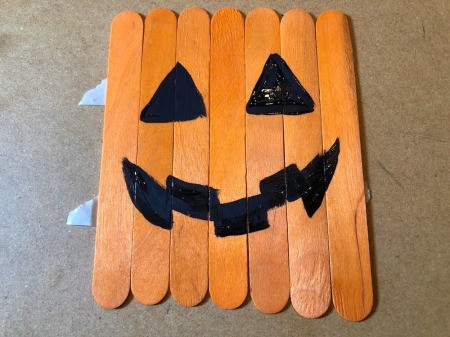 Halloween Craft Stick Puzzles - add detail to the smile