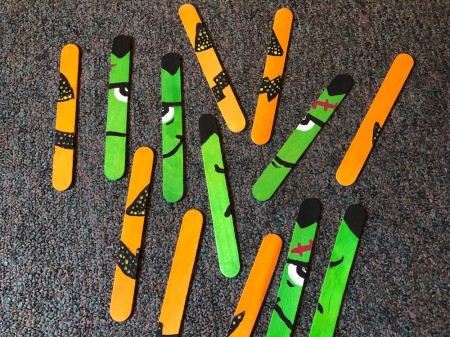 Halloween Craft Stick Puzzles - mix up the pieces and you are ready to assemble