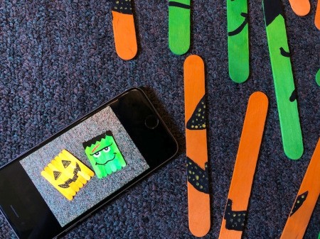 Halloween Craft Stick Puzzles - take a photo of the finished puzzles and then flip over and remove the tape