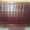 Value of Encyclopedia Britannica and Wagnalls Dictionary - books of the year on a shelf