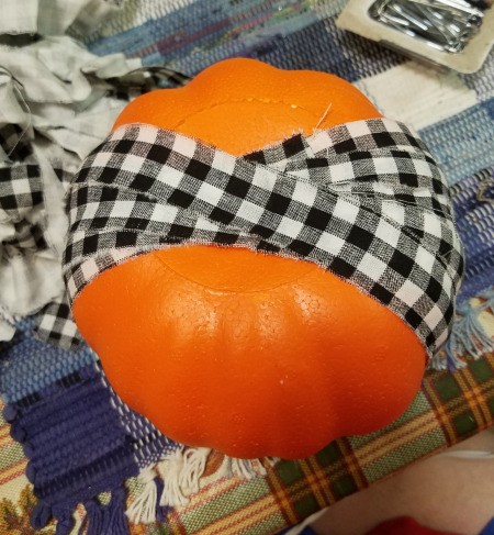 Black and White Fabric Strip Foam Pumpkin - continue wrapping strips and securing with pins