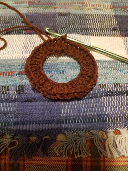 Sunflower Photo Frame - join with a slip stitch and work in the tail