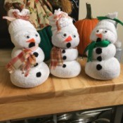 Sock Snowman - trio of snow people on a shelf