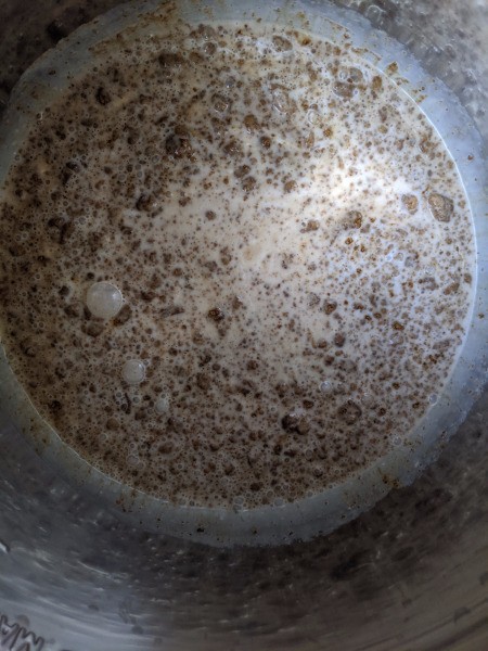 coconut milk & tandoori spice in pot