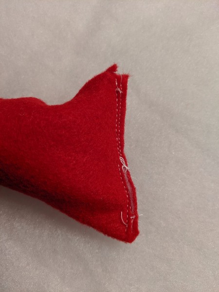 Toddler Girl's Dragon Halloween Costume - sew the end of the tail closed