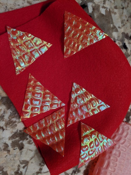 Toddler Girl's Dragon Halloween Costume - cut an equal number of triangles