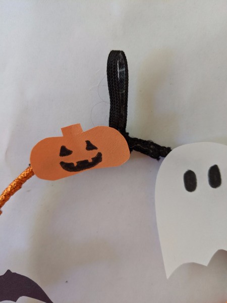 Hanging Halloween Themed Hoop Decoration - closeup of the ghost and a pumpkin on the hoop